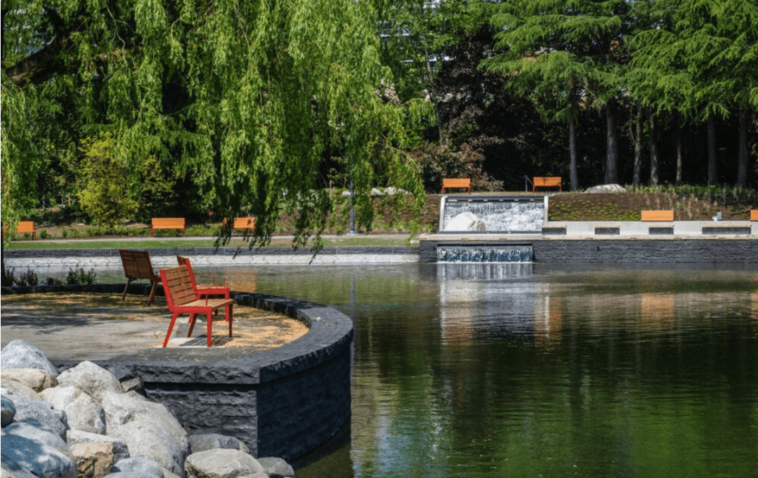 Cascade water feature in polished basalt and granite — Minoru Lakes, Central Richmond
