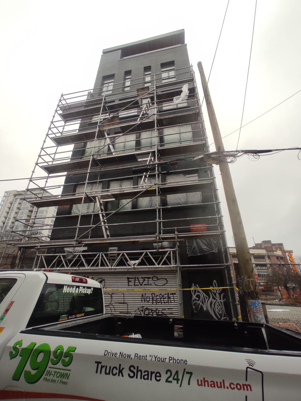 Restored facade with scaffold still in place — The Keefer