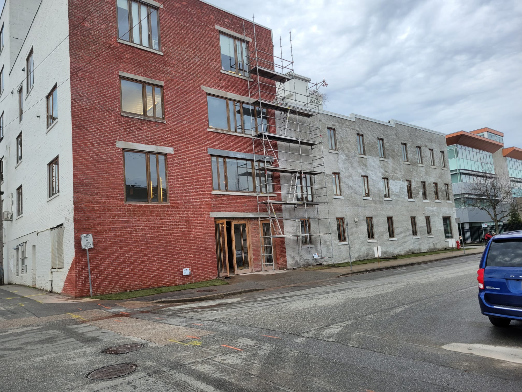Restored brick corner alongside original masonry — Living Spaces