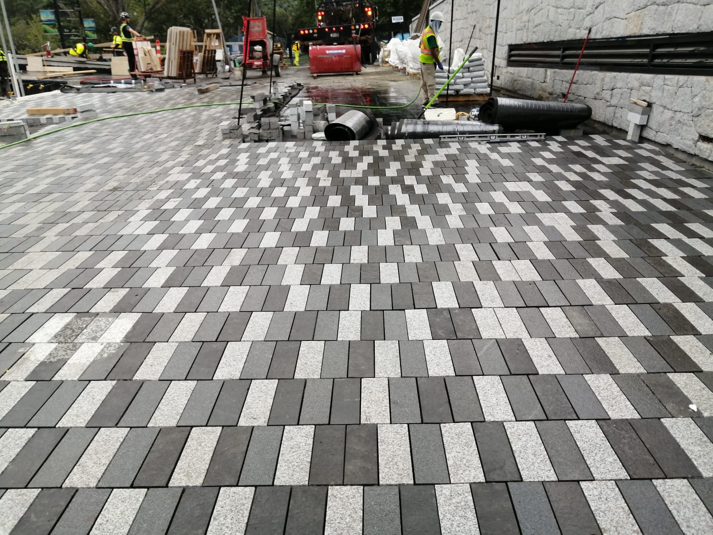 Wide paver field installation in progress — Sewell's Landing